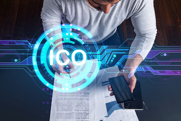 Good looking man working on ICO project. Multiexposure. Crypto currency concept.