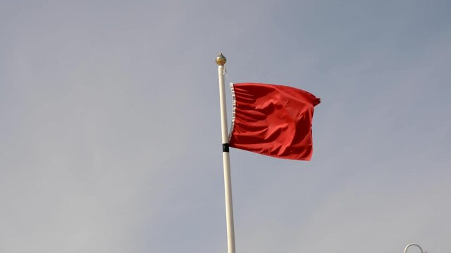 Red flag on the wind