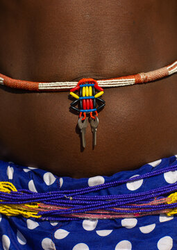 Mudimba tribe woman wearing her keys on a belt, Cunene Province, Cahama, Angola