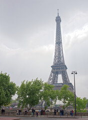 View of the Eiffel Tower from  De Varsovie square.On the square walk and take pictures of tourists