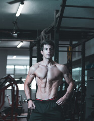 Fototapeta na wymiar young athlete training inside a gym. healthy lifestyle. to compete.