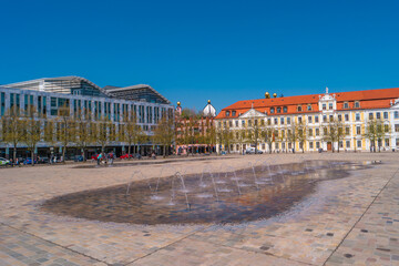 Naklejka premium View over major square with fountains in Magdeburg by Cathedral and Government Office, at sunny day and blue sky.