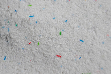 Laundry detergent powder, housekeeping and hygiene related background.