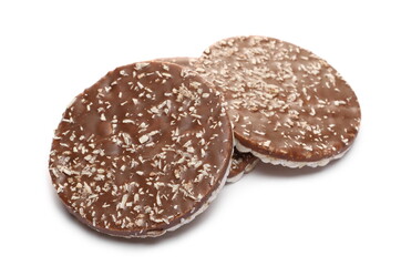 Milk chocolate rice cakes with coconut shavings isolated on white background
