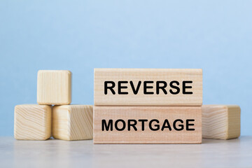 REVERSE MORTGAGE. WOODEN BARS with information on the desktop.