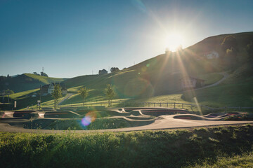 a view of a pump track at sunrise, Urnäsch, switzerland, alps, europe