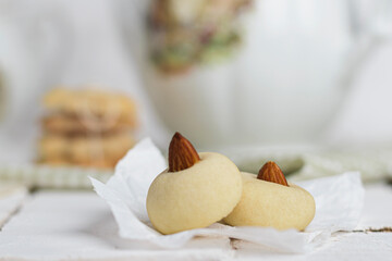 My sister spill the milk on chocolate hot drink to prepare breakfast with Eid Cookies which is called Kahk.
