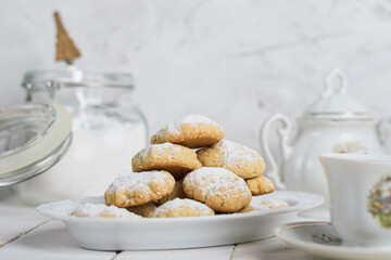 My sister spill the milk on chocolate hot drink to prepare breakfast with Eid Cookies which is called Kahk.

