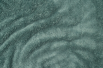 Fototapeta na wymiar Abstract macro green vintage fluffy fabric texture background