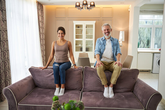 Positive Delighted People Being At Home Together