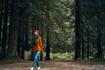 woman hiker walking in the woods walk fresh air nature