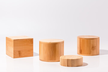 Wooden podiums for product display on white background