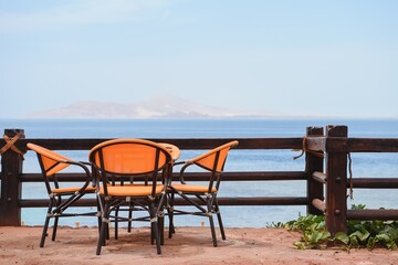 table in the restaurant on the sea background