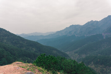Obraz premium The beautiful mountainous area on a cloudy morning. Mountain landscape for background