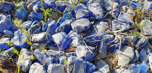 Panorama of blue glass stones for decoration.
