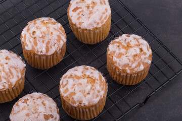 delicious fresh muffins on a wire rack.