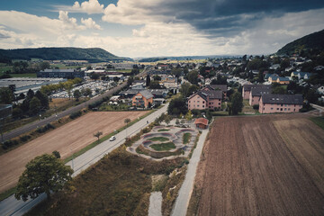 view of a pump track next to a road and two fields, Schaffhausen, Switzerland, Europe