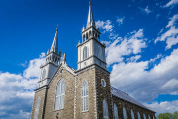 Obraz premium the 19th century church of the small town of Saint Roch des Aulnaies in Quebec (Canada)