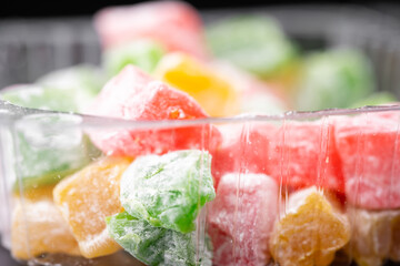Packaged candies of different colors