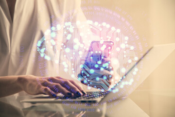 Double exposure of brain sketch hologram and woman holding and using a mobile device.