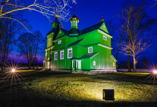 a beautiful green historic church in the village of Trześcianka, Podlasie, Poland