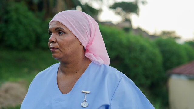 Portrait Of Nurse In Scrubs Prepared To Leave Home For Work