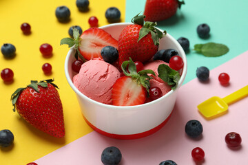 Fruit ice cream and ingredients on color background
