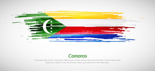 Artistic grungy watercolor brush flag of Comoros country. Happy independence day background
