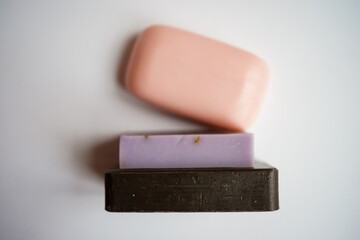 three bars of soap on a white background