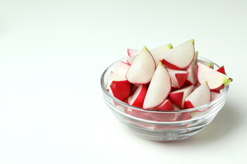Bowl of fresh radish on white background, space for text