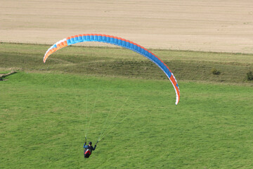 Paraglider flying at Milk Hill, Wiltshire
