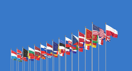 The 30 waving Flags of NATO Countries - North Atlantic Treaty. Isolated on sky background  - 3D illustration.