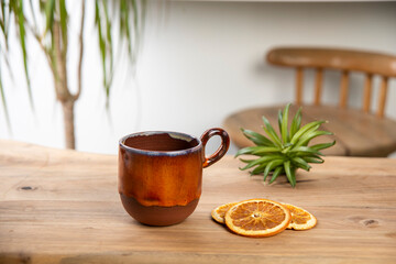 coffee cup on wooden table with coffee