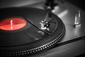Vinyl Records and turntable. Motion of the turntable with shallow depth of field