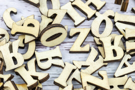 messy alphabet letters made of wood