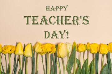 Horizontal greeting card with the inscription Happy Teachers Day on a beige background with yellow tulips.