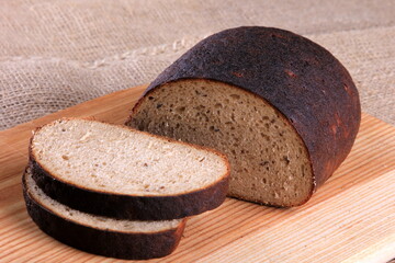 Traditional Loaf of Latvian sweet and sour bread on the table. Sweet Rye bread