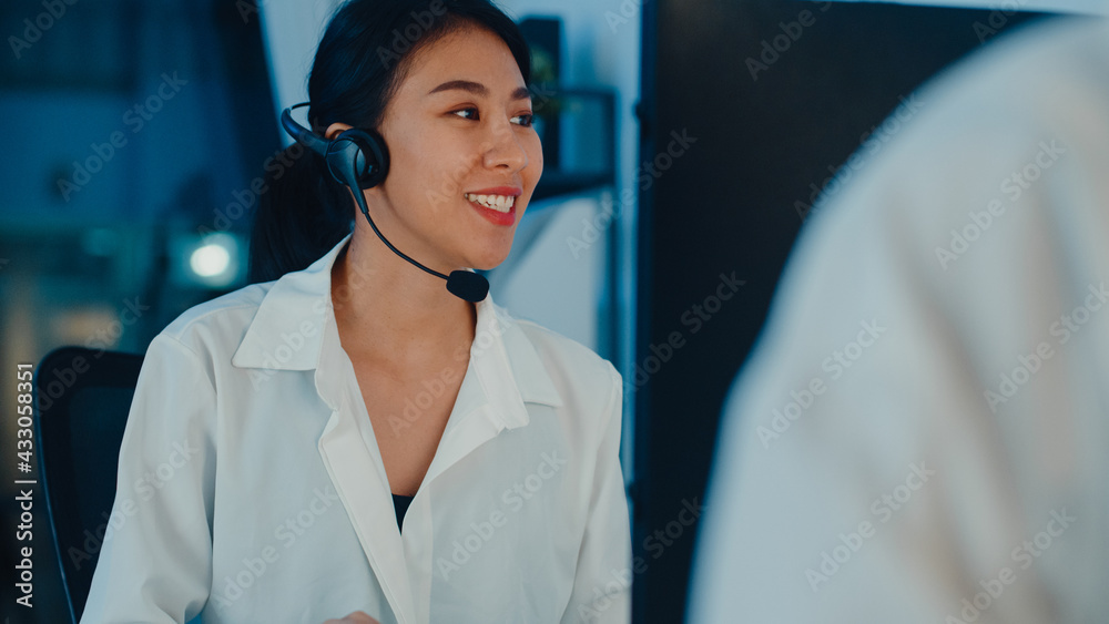 Wall mural millennial asia young call center team or customer support service executive using computer and micr