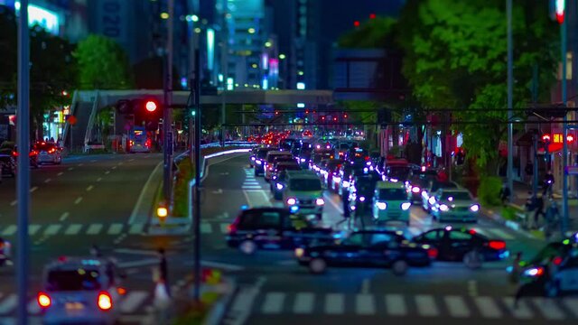 A night timelapse of the miniature urban city street in Aoyama tiltshift zoom