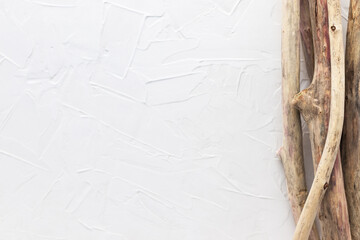 Sanded driftwood on white putty background. - obrazy, fototapety, plakaty