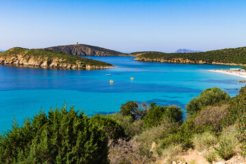 Fototapeta na wymiar Striking view of a turquoise water and the white sand beach of Tuerreda.