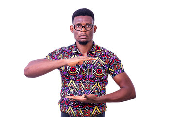 young serious man with hands showing a sign of tall and tall.