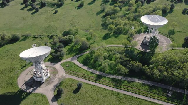 Aerial view of large telecommunications antenna or Radio telescope satellite dish. High quality 4k footage