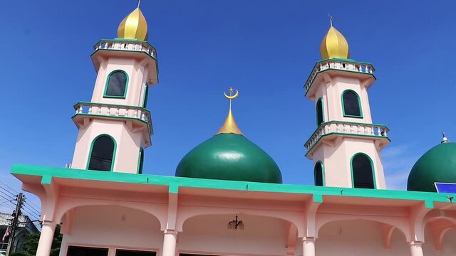 Gold turquoise Thalang Mosque Lil Abidin Mosque architecture Phuket Thailand.