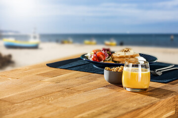 Mediterranean breakfast on a wooden table on a beautiful sunny day 