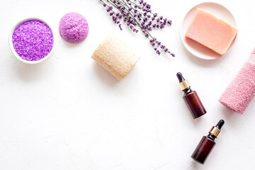Obraz na płótnie Canvas Lavender cosmetics spa set. Natural spa essential oil and sea salt
