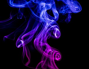 Obraz premium Colored smoke on black background