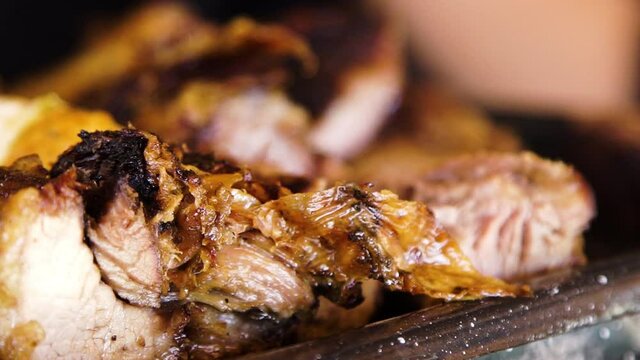 Typical parrillada, barbecue, with meat and potatoes in Argentina, close up