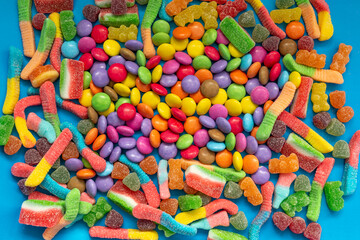 Background of many colourful Halloween candies