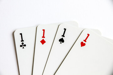 Four aces playing card game on white background